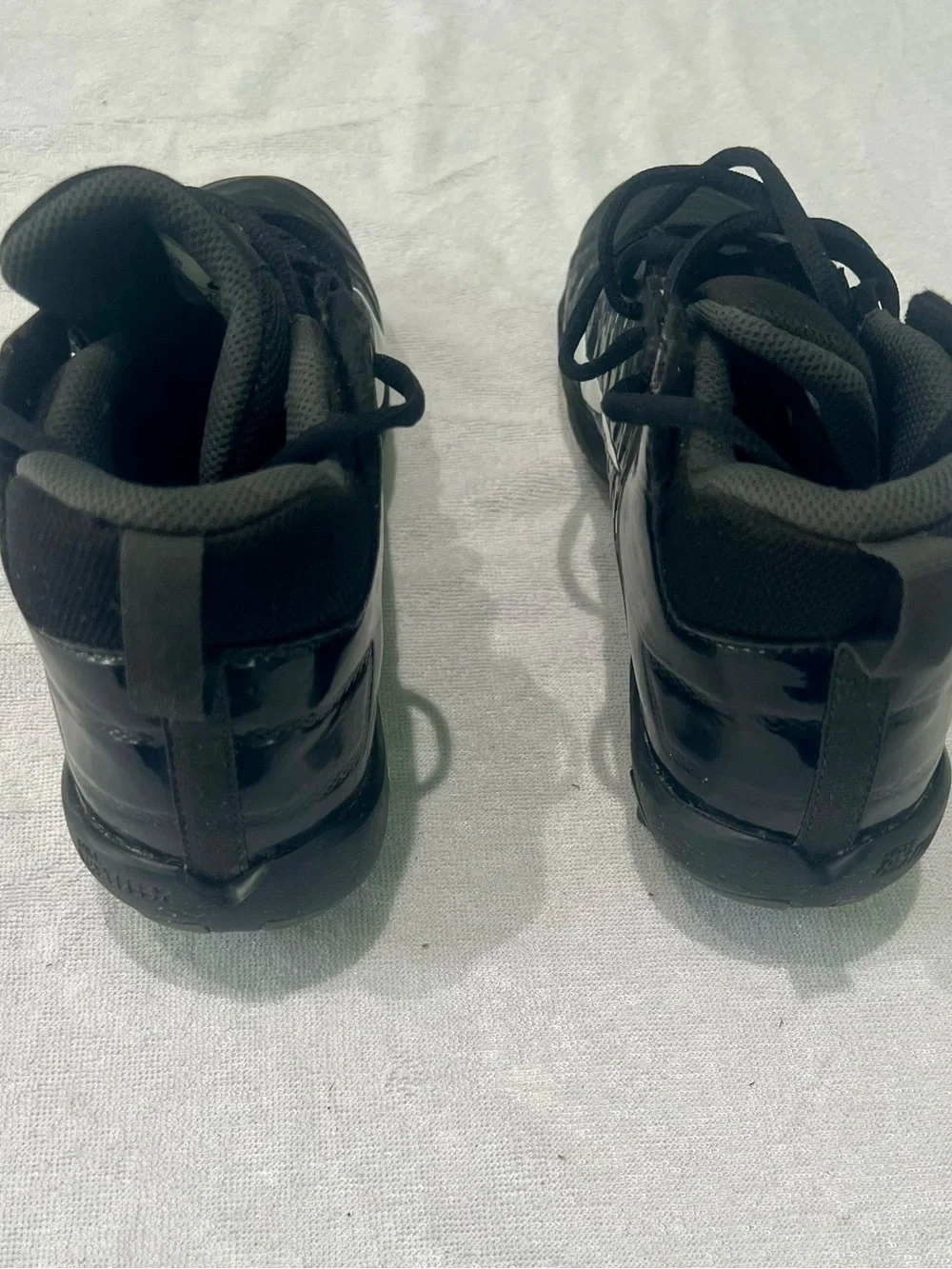 Nike Black High-Top Sneakers with White Swoosh Accent